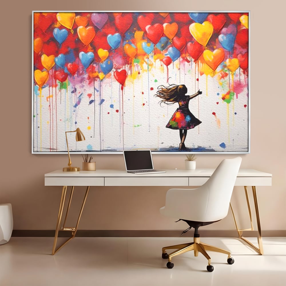 Tablou canvas cu tablou canvas cu fetita si baloane inima, in rama de aluminiu argintiu, pe perete intr-un birou